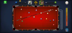 Red table with a long cut shot lined up across the baize