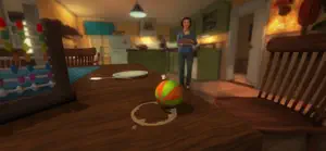 The kitchen from a toddler's height: a ball on the table, mother standing by the counter