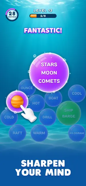 Level 13 with 28 moves left, a planet picture bubble dragged toward a purple STARS MOON COMETS set