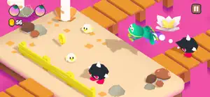A candy-pink stage with a black bat, white blobs and a fenced platform