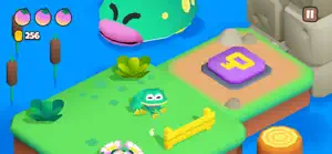 The frog on a grass island beside a purple platform with a save flag