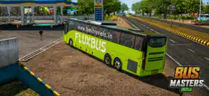 A green Fluxbus coach parked beside a highway toll lane under a clear sky