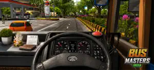 The driver's cab view with the dashboard, steering wheel and a rear-view mirror at a bus stop