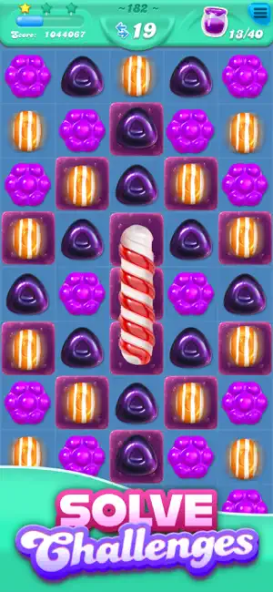 Level with a candy cane obstacle and honeycomb tiles