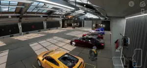 A multi-storey garage full of parked cars with a yellow sports car in front