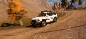 A white off-road wagon sliding on a dirt road in autumn