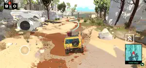 The van on a red dirt road past a crashed satellite dish and dry pines