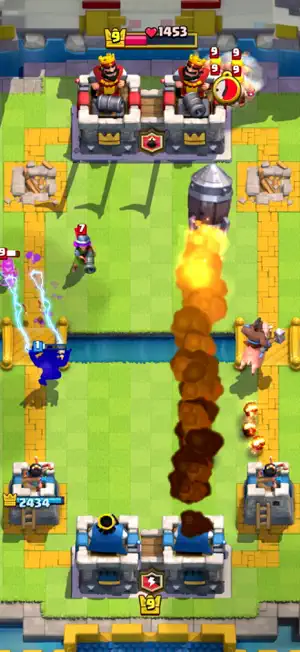 Match in progress as a fireball travels toward a tower