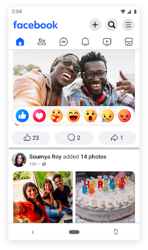 Facebook Lite reaction picker showing seven reactions above a photo post with 23 likes and 2 comments