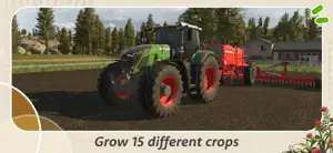 Green Fendt tractor with a red seeder working a freshly tilled field