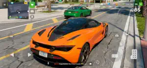 An orange supercar and a green one parked on a city street at sunset