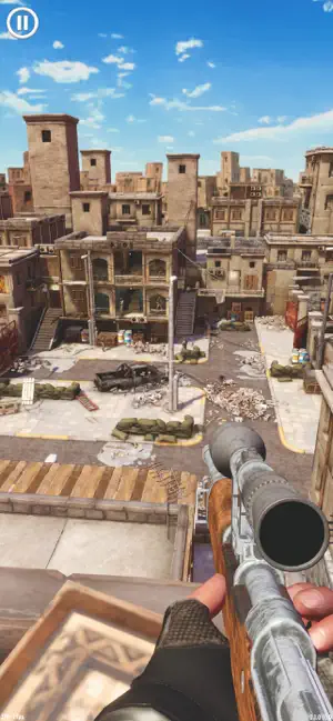 A ruined town of stone houses under a cloudy sky from a sniper's perch