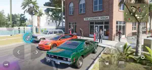 Green muscle car, a red coupe and a van parked outside a brick corner shop with pedestrians