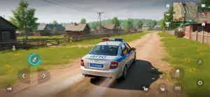 ДПС-liveried police car on a dirt road beside a village fence
