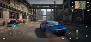 Blue muscle car under an industrial overpass with pipes and warehouses