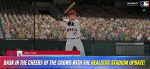 Hitter celebrating at bat under stadium lights