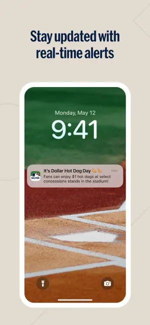 Lock-screen push alert announcing Dollar Hot Dog Day with $1 hot dogs at select concession stands
