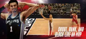 Player attempting a dunk with a defender contesting