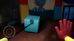 Grabber hand pulling a crate near a large mascot