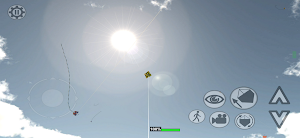 Looking up the line at a kite against the sun, with movement and camera controls on the right