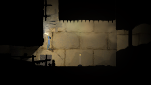 A hanging lantern lights a stone stairway as the boy climbs past a ladder