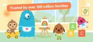 Monkey in a banana car, a blue one-eyed monster, a rainbow on an easel and a pink bird on ABC blocks, captioned Trusted by over 100 million families