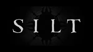 The Silt title in white serif letters over a black sea-creature silhouette