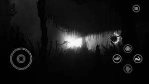 A glowing anglerfish lure in a dark cavern with a hanging vine ceiling