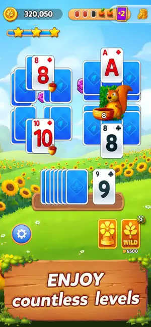 TriPeaks board with acorn-marked cards, a squirrel holding a basket and a Wild booster priced at 6,500 credits