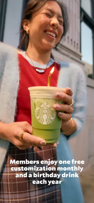 Smiling woman holding a green iced matcha drink topped with a birthday candle, captioned about a monthly free customization and a birthday drink