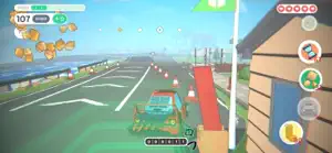 A coastal highway with cones and a blue car ahead