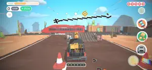 A red train crossing a bridge ahead of the truck
