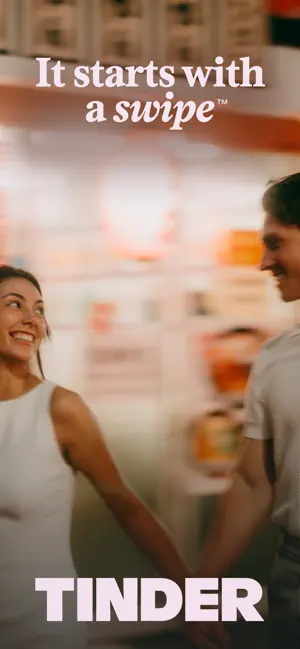 Tinder launch screen with the tagline "It starts with a swipe" above the Tinder wordmark