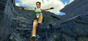 Lara pistols drawn on a Tibetan cliff ledge in Tomb Raider II