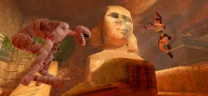 Firing at a giant stone guardian beside a sphinx statue