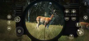 A red stag seen through a rifle scope with the touch controls and zoom buttons around it