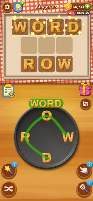 Ginger 05 level with W, O, R and D swiped across the frying pan to spell WORD above the solved ROW