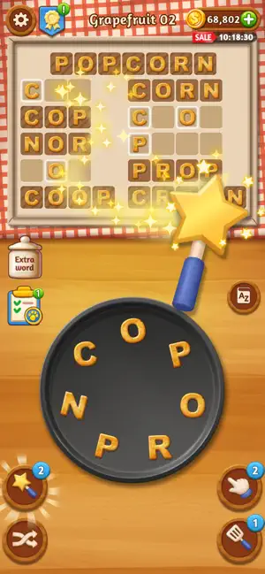 Grapefruit 02 grid with POPCORN, CORN and CROP as a magic wand hint reveals letters beside the Extra word jar